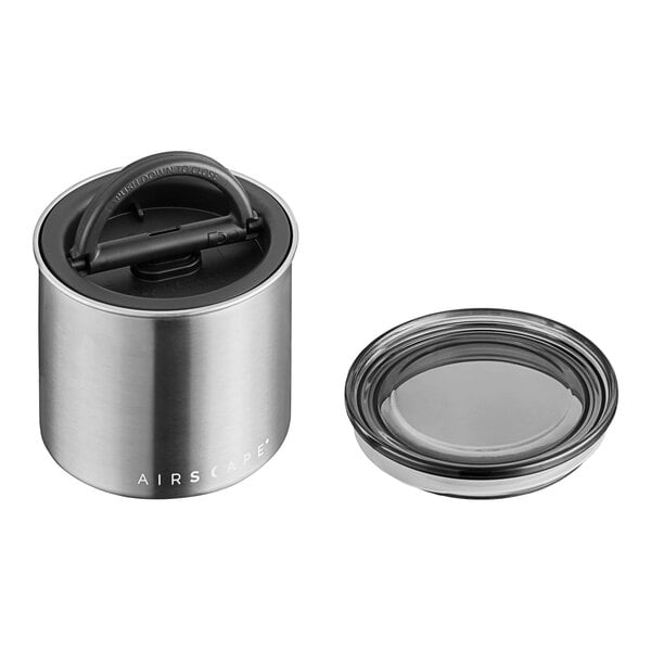 A Planetary Design brushed stainless steel round airtight food storage container with lid.