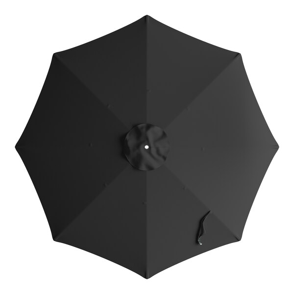 A black umbrella canopy for a Lancaster Table & Seating umbrella with a white pulley.