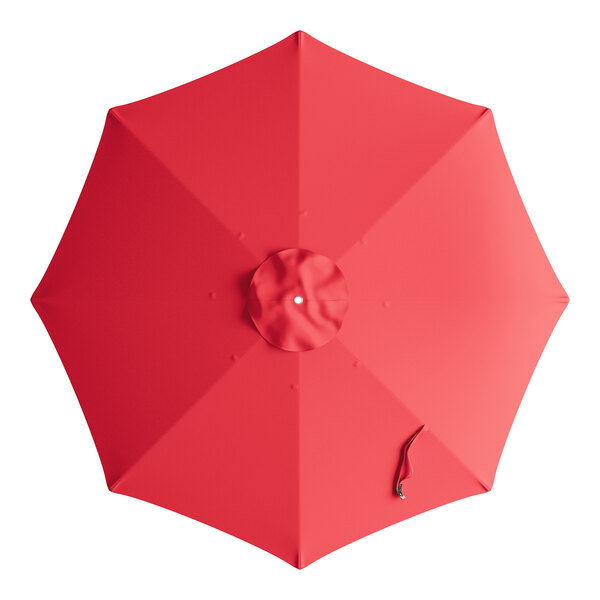 A red umbrella with a white handle.