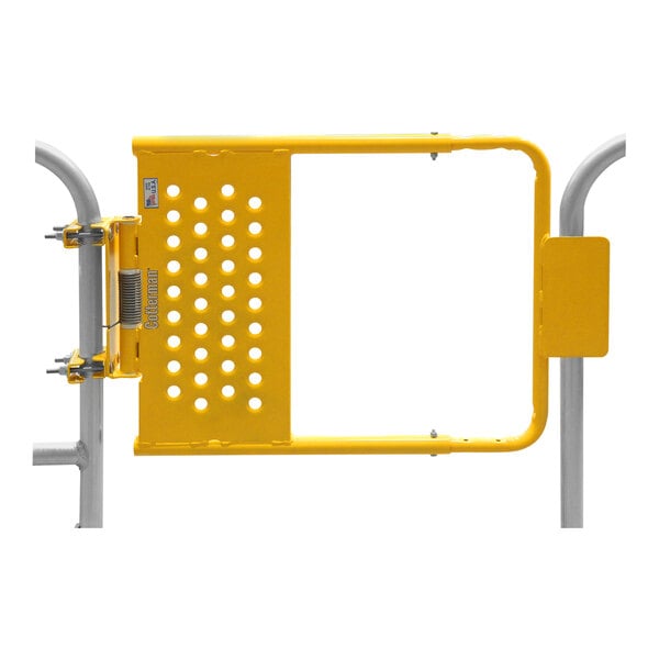 A yellow powder-coated metal safety gate with holes.