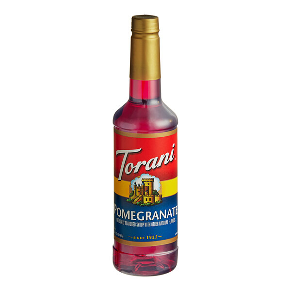 A Torani 750 mL plastic bottle of red liquid with a red label.