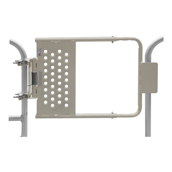 A stainless steel safety gate with a metal frame and holes.