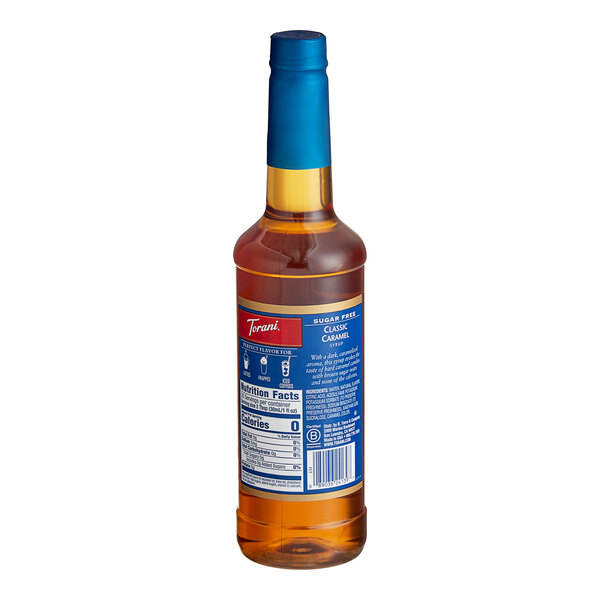 A Torani Sugar-Free Classic Caramel flavoring syrup plastic bottle with a blue label.