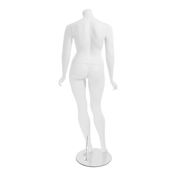 A headless white female mannequin with a bent right leg on a silver base.