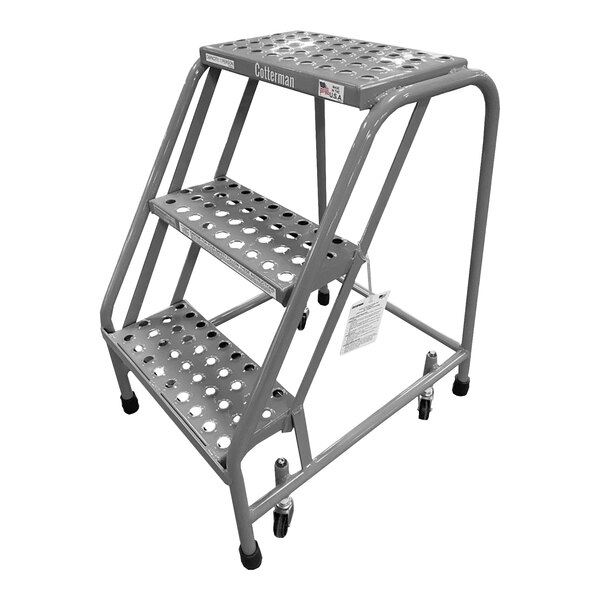 A Cotterman gray steel rolling ladder with perforated steps and 3 steps.