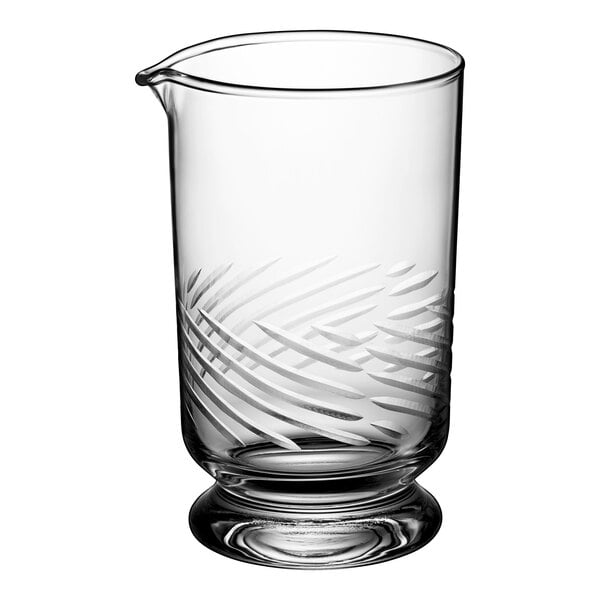 An Acopa clear glass stirring glass with a design on it.