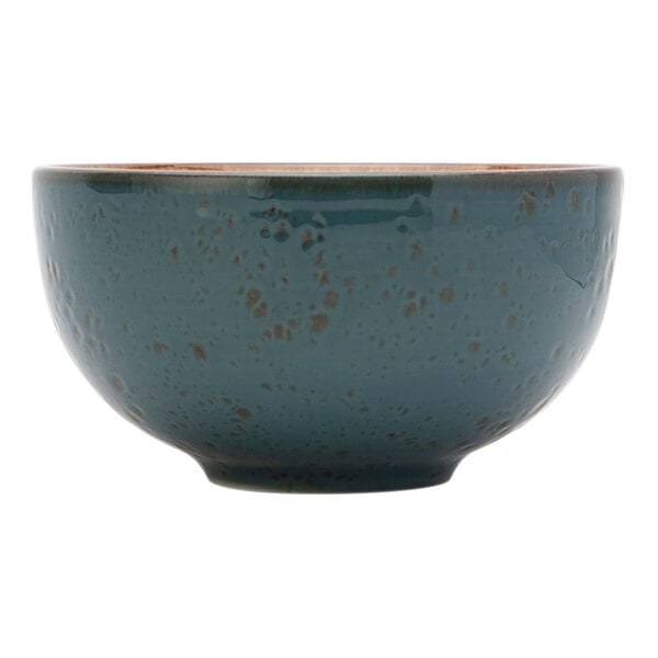 A Tuxton TuxTrendz Azure China bowl with speckled brown and blue on a white background.