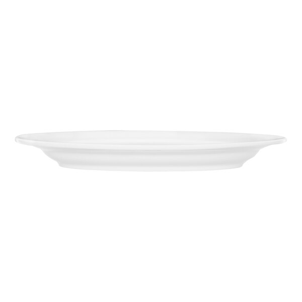 A Tuxton Modena AlumaTux oval china platter with a white surface and white rim.