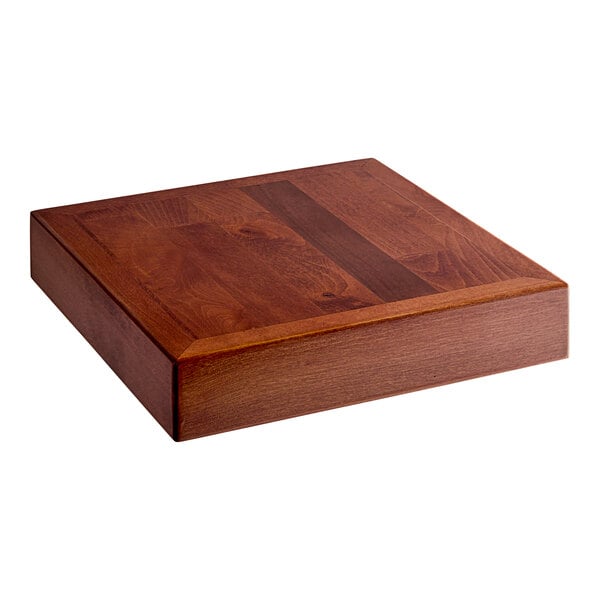 A Lancaster Table & Seating square wooden butcher block table top with a mahogany finish.