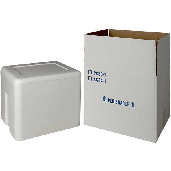 A white box with blue writing on it containing a white styrofoam cooler.