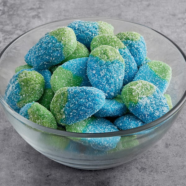 A bowl of blue and green Vidal Sour Gummy Wild Raspberries.