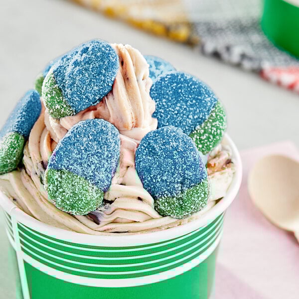 A close-up of blue and green Vidal sour gummy candies.