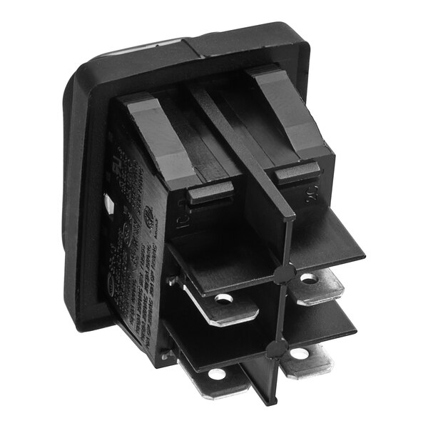 A green Hatco DPST rocker switch with metal parts and two black wires.