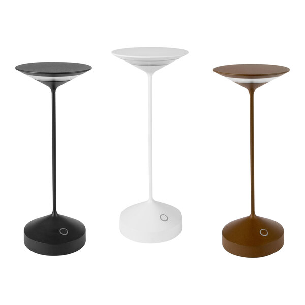 Three white Abert Tempo rechargeable table lamps on a table.