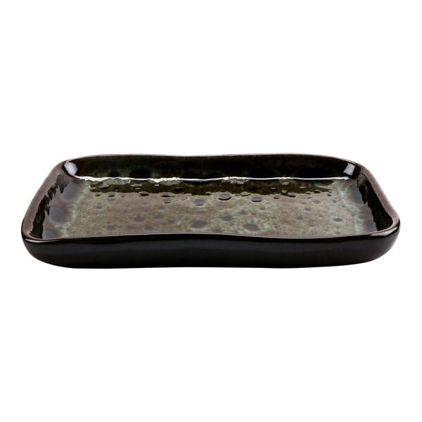 A cheforward rectangular terracotta tray with a stone heart design.