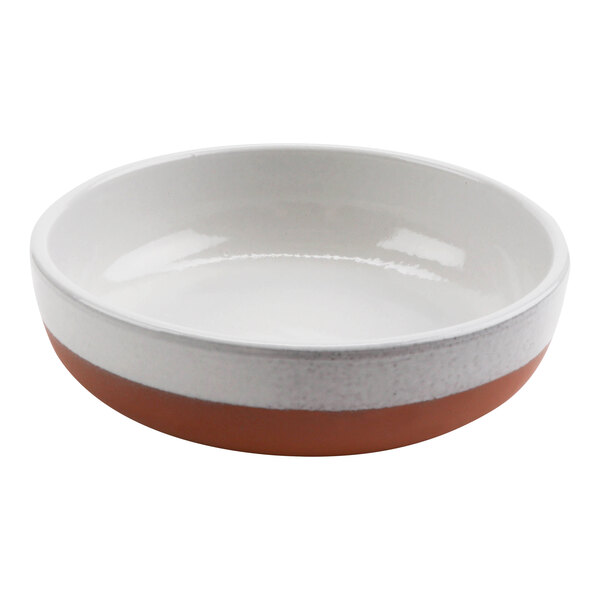 A white terracotta bowl with a white rim.