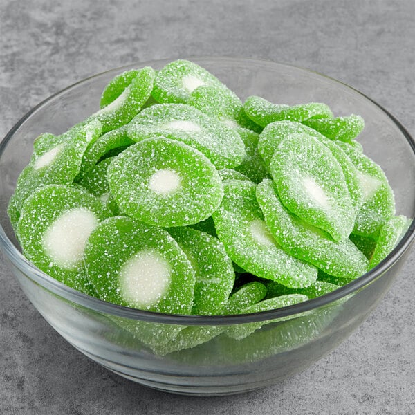 A bowl of Vidal Sour Gummy Kiwi candies.