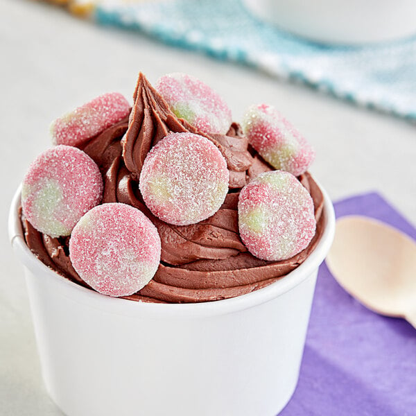 A close up of pink and white Vidal Sour Gummy Watermelon and Lime Bites.