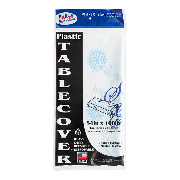 A white plastic Table Mate table cover with a blue and white snowflake pattern and "Season's Greetings" in blue text.