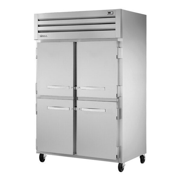 A True STA2F-4HS-HC Spec Series reach-in freezer with two half doors.