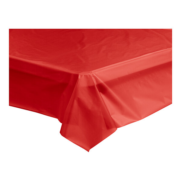 A red Table Mate plastic table cover on a table.