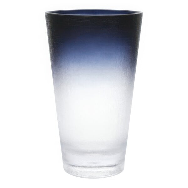 A Fortessa La Cote Tritan plastic highball glass with a blue and white gradient.