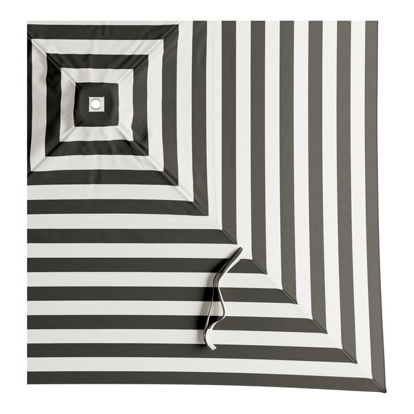 A black and white striped Lancaster Table & Seating umbrella canopy.