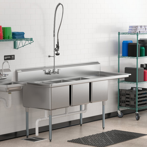 A Regency stainless steel 3 compartment sink with right drainboard.