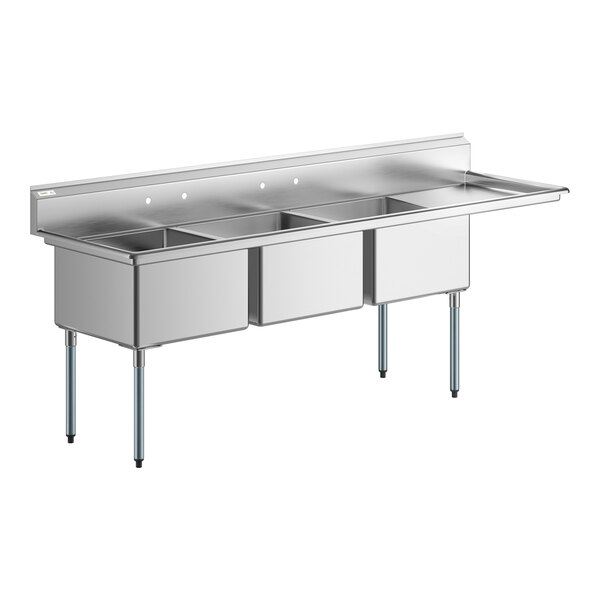 A Regency stainless steel three compartment sink with right drainboard.