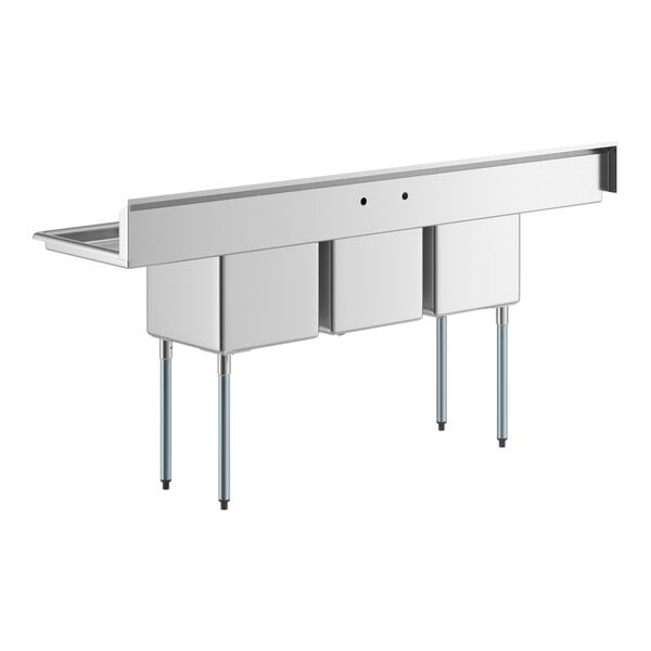 A Regency stainless steel 3 compartment sink with 2 drainboards.