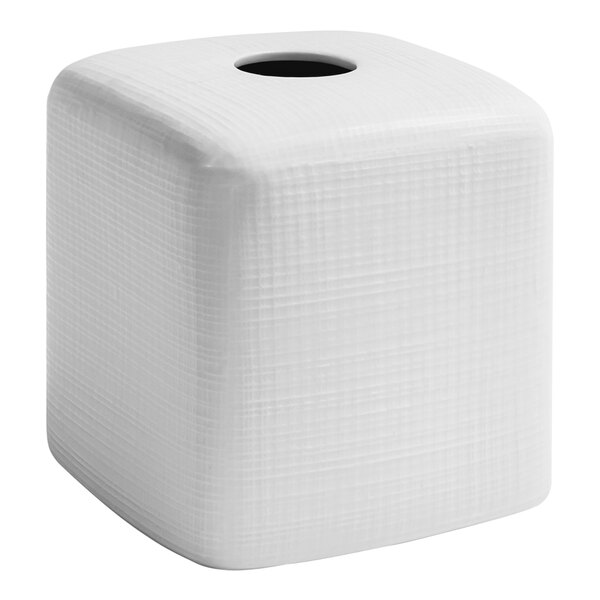 A white square porcelain tissue box cover with a hole in it.