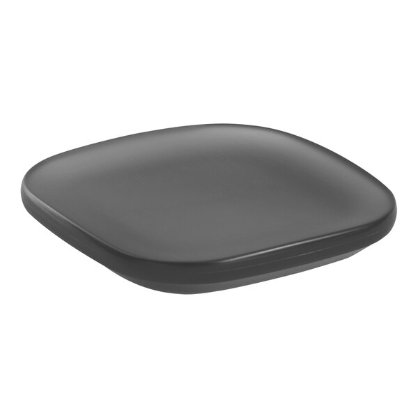 A black square Room360 soap dish with a gray rim on a counter.