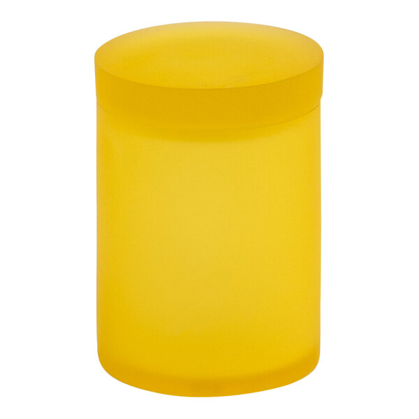 A yellow Room360 Nassau storage jar with a lid.