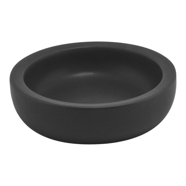 A black soap dish with a white background.