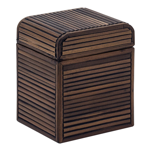 A brown wooden Room360 storage jar with a lid.