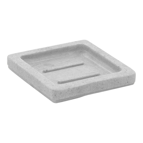 A grey stone soap dish with a rectangular shape and two handles.