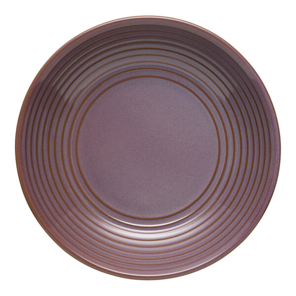 A mauve terracotta Libbey coupe bowl with brown stripes.