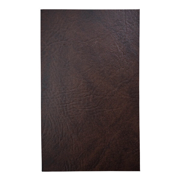 A close-up of a brown leather H. Risch menu cover.