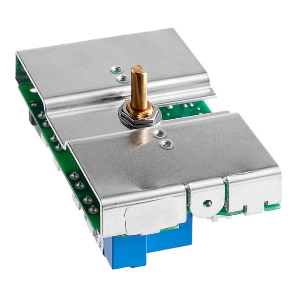 A metal and green device with a gold metal bolt.