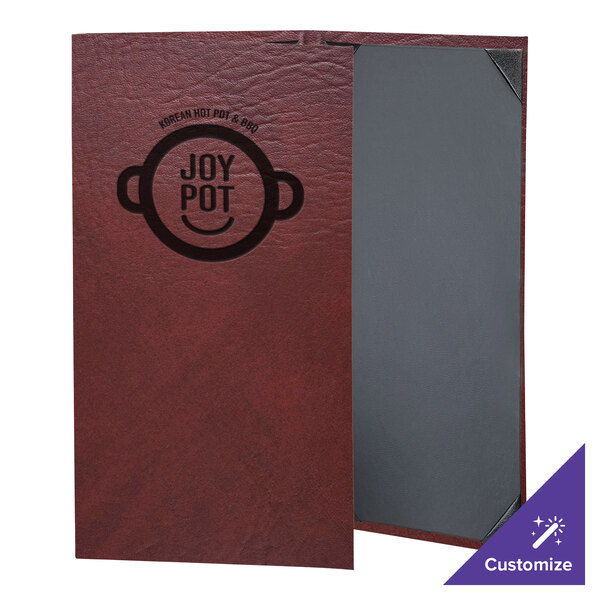 A brown leather H. Risch, Inc. wine menu cover with the word "Harley" on it.