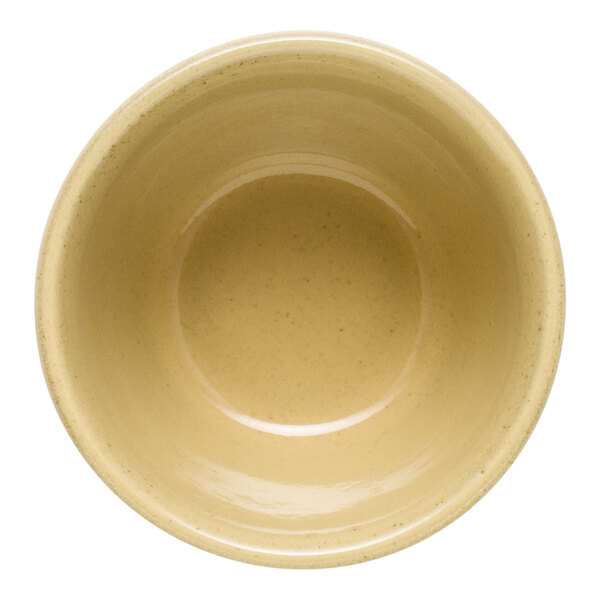 A tan Libbey terracotta dip dish.