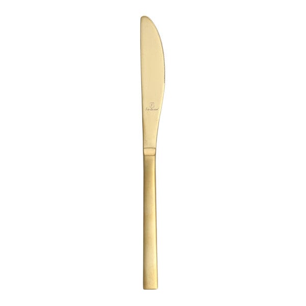 A close up of a Fortessa Arezzo stainless steel table knife with a brushed gold handle.