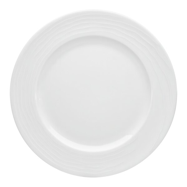 A Bauscher bright white porcelain plate with a wide, embossed rim.