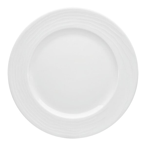 A Bauscher bright white porcelain plate with a wide rim and a circular pattern.