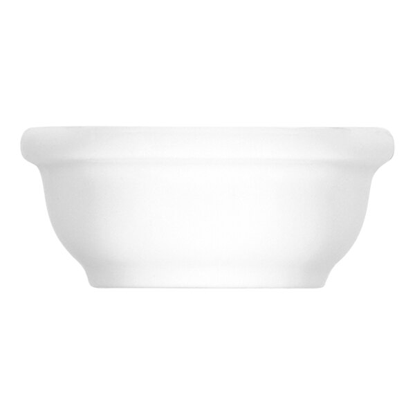 A Bauscher bright white porcelain butter dish with an embossed rim.
