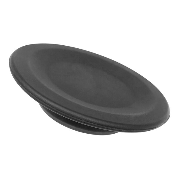 A black round NaceCare Solutions citrus scent pod with a circular hole in the center.