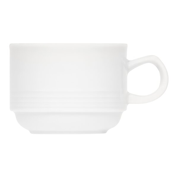 A close up of a Bauscher bright white porcelain cup with an embossed design and handle.