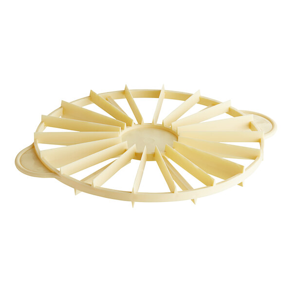 A circular yellow plastic Matfer Bourgeat cake marker with many rows of blades.