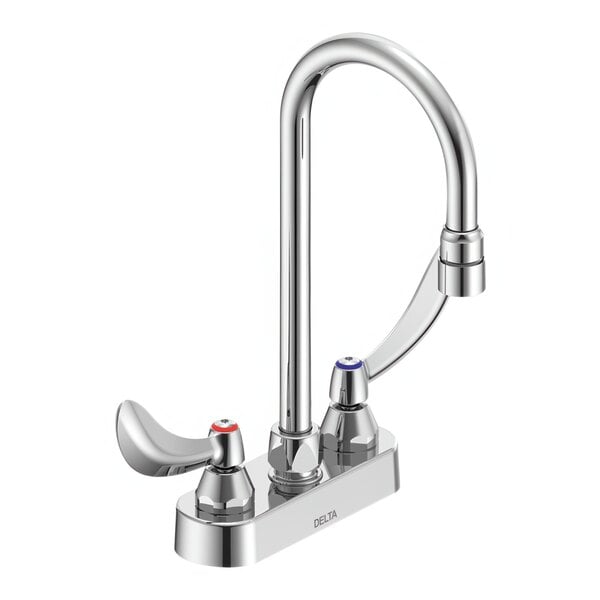 A silver Delta deck-mount lavatory faucet with two wrist blade handles and a gooseneck spout.