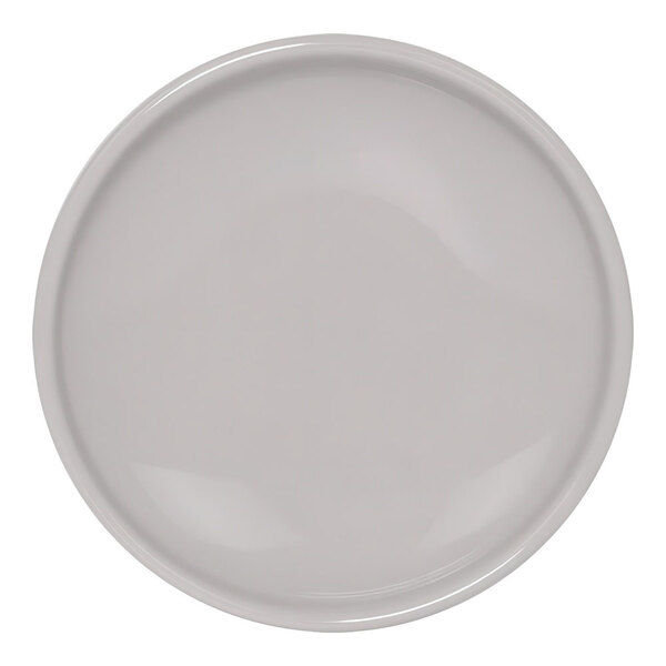 A white plate with a round white rim.